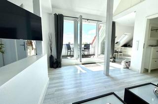 Anlageobjekt in 23669 Timmendorfer Strand, ++ FERIENWOHNUNG ALS ATTRAKTIVES INVESTMENT ++ DG-Wohnung mit Loggia und TG-Stellplatz.