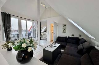 Anlageobjekt in 23669 Timmendorfer Strand, ++ FERIENWOHNUNG ALS ATTRAKTIVES INVESTMENT ++ DG-Wohnung mit Loggia und TG-Stellplatz.