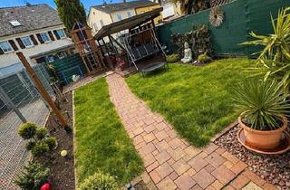 Wohnung kaufen in 67122 Altrip, Altrip - Charmante Erdgeschosswohnung mit Privaten Garten und Stellplätzen
