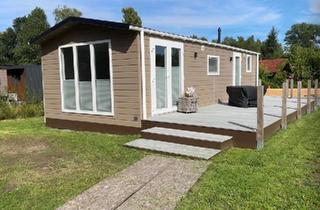 Haus kaufen in 27624 Geestland, Geestland - Helles Mobilheim 43 2 J alt Fußbhz am Wasser 3 Zi Kü hochw Bad