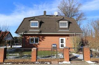 Haus kaufen in 15295 Brieskow-Finkenheerd, Lichtdurchflutetes Wohnerlebnis: EFH mit Sauna, Keller und 2 Garagen auf großem Grundstück!