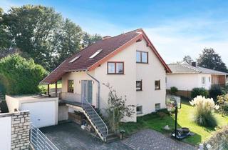 Haus kaufen in 55286 Wörrstadt, Lichtdurchflutetes Familienhaus mit idyllischem Garten