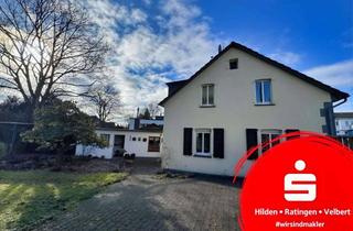 Einfamilienhaus kaufen in 42781 Haan, Sanierungsbedürftiges Einfamilienhaus mit Anbaupotenzial auf großem Grund