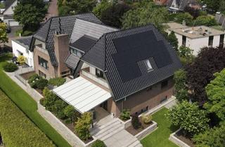 Villa kaufen in 30826 Garbsen, Villa mit Traumgarten und Wellnessoase