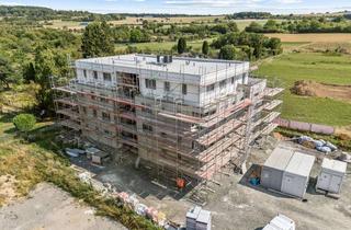 Wohnung kaufen in 61239 Ober-Mörlen, Im Erstbezug nach Fertigstellung: Großzügige 2-Zimmerwohnung mit Balkon und Stellplätzen