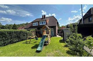 Doppelhaushälfte kaufen in 25436 Uetersen, Modernisierte Doppelhaushälfte mit Carport in familienfreundlicher Wohnlage von Uetersen