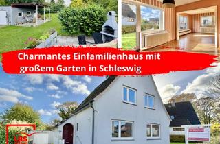 Einfamilienhaus kaufen in 24837 Schleswig, Neuer Preis: Charmantes Einfamilienhaus mit großem Garten in Schleswig