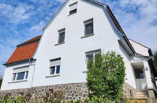 Mehrfamilienhaus kaufen in 61137 Schöneck, Attraktives Investmentpaket: Vollvermietetes Mehrfamilienhaus mit 4 Einheiten & 8 Garagen, Schöneck