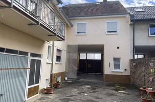 Haus kaufen in 61239 Ober-Mörlen, Wohnhaus mit großem Garten und Ausbaupotenzial