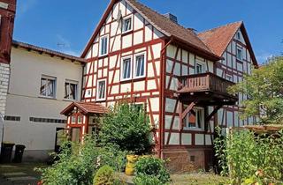 Anlageobjekt in Rathausstrasse 13, 35112 Fronhausen, Top Angebot! Charmantes Mehrfamilienhaus mit Gewerbeeinheit und Garten!