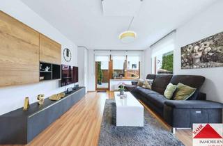 Wohnung kaufen in 71069 Sindelfingen, 4-Zimmer-Erdgeschosswohnung mit großer Terrasse, Gartenanteil und Garagen
