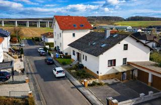 Mehrfamilienhaus kaufen in 35428 Langgöns, Mehrfamilienhaus mit drei Einheiten in ruhiger Feldrandlage von Langgöns