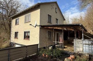 Einfamilienhaus kaufen in 37269 Eschwege, Einfamilienhaus mit 2 Garagen, Balkon und Terrasse in Ortsrandlage