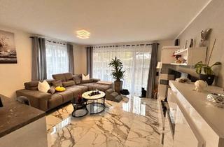 Haus kaufen in 71120 Grafenau, Grafenau - Stilvolle 3-Zimmer-Erdgeschosswohnung mit Garten