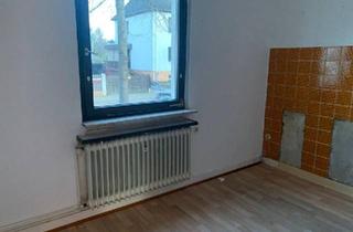 Mehrfamilienhaus kaufen in 63071 Offenbach am Main, Offenbach am Main - Geräumiges Mehrfamilienhaus mit zwei Wohnung und Ausbaupotenzial