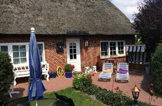 Haus kaufen in 25845 Nordstrand, Nordstrand - Reetdachhaus direkt am Deich auf Nordstrand