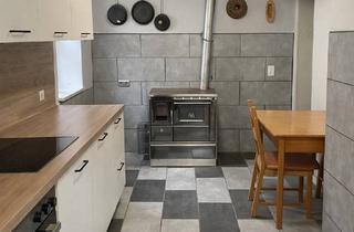 Einfamilienhaus kaufen in 96155 Buttenheim, Charmantes Einfamilienhaus mit barrierefreiem Zugang, idyllischem Garten und großzügiger Scheune.