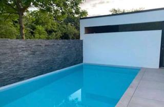Einfamilienhaus kaufen in Albert-Schweitzer-Straße 23f, 67269 Grünstadt, Einmaliges Einfamilienhaus mit Pool in Feldrandlage
