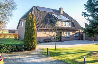 Haus kaufen in 26209 Hatten, Hochwertiges Zweifamilienhaus mit großem Grundstück in Hatten