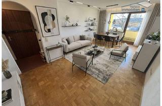 Wohnung kaufen in 86916 Kaufering, Modernisierte 3-Zimmer-Wohnung mit Süd-Balkon und TG-Stellplatz in zentraler Lage