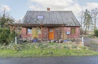 Einfamilienhaus kaufen in 21737 Wischhafen, Handwerkerobjekt in ruhiger Lage – Einfamilienhaus mit Garage und Potenzial