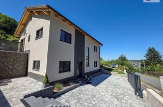 Einfamilienhaus kaufen in 08280 Aue, Wohnen mit Blick auf Aue - Einfamilienhaus mit Garten und Garagen, Energieeffizienz trifft Lifestyle
