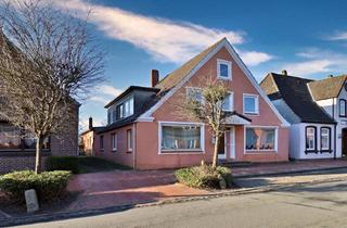 Mehrfamilienhaus kaufen in 25774 Lunden, Mehrfamilienhaus mit Ausbaureserve in zentraler Lage von Lunden