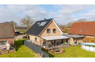 Einfamilienhaus kaufen in 26629 Großefehn, Modernes Einfamilienhaus im Grünen – Südterrasse mit Weitblick & Platz für die Familie