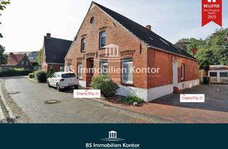 Einfamilienhaus kaufen in 26736 Krummhörn, Küstenregion! Gepflegtes Einfamilienhaus mit zwei Wohnungen und Terrasse!
