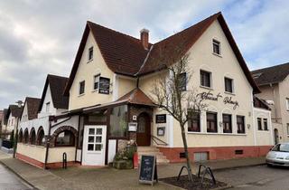 Mehrfamilienhaus kaufen in 68782 Brühl, Mehrfamilienhaus mit Gewerbeeinheit und solider Rendite.