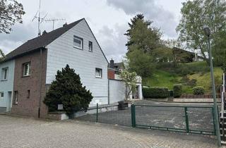 Doppelhaushälfte kaufen in 52477 Alsdorf, Doppelhaushälfte mit 1.188 m² Grundstück, Hof und eigenem Wiesengrundstück am See