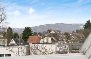 Wohnung kaufen in 61350 Bad Homburg, Lichtdurchflutete Maisonette mit Wintergarten und Taunusblick