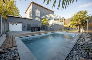 Haus kaufen in 76477 Elchesheim-Illingen, Wohnen mit privater Wellness-Oase im Freien