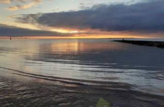 Wohnung kaufen in 26548 Norderney, Nordsee-Idylle: 2-Zimmer-Oberwohnung mit Blick auf dem Onnen-Visser-Platz der Insel Norderney!