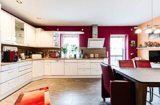 Haus kaufen in 25764 Wesselburen, Neuwertiger Bungalow mit 2x Terrassen & Carport in Sackgassenlage