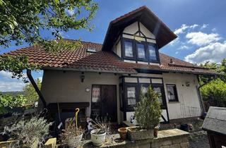 Einfamilienhaus kaufen in 34311 Naumburg, Einfamilienhaus mit Einliegerwohnung und Doppelgarage in ruhiger Lage von Naumburg