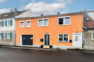 Haus kaufen in 97320 Albertshofen, Albertshofen - Charmantes Reihenmittelhaus mit Gartenhaus, Garage & flexibler Nutzung