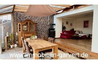 Wohnung kaufen in 46414 Rhede, Charakter statt Standard – stilvolles Wohnunikat in ruhiger Lage in Rhede mit Garage und Kamin