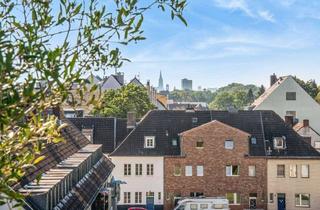 Wohnung kaufen in 50735 Niehl, Exklusive Maisonette mit Dachterrasse, Dom-Blick und 2 Stellplätzen