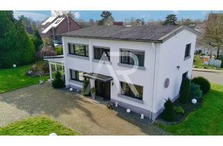 Haus kaufen in 52445 Titz, Großzügiges Familiendomizil mit großem Wintergarten und Gartenparadies in Südlage in Titz-Rödingen!