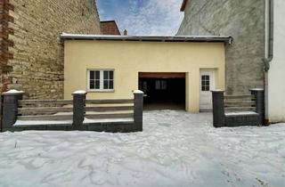 Haus kaufen in 39397 Gröningen, „Kompakt wohnen, großzügig parken – Reihenmittelhaus in Gröningen“