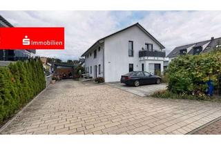Anlageobjekt in 35457 Lollar, Neuwertiges und exklusives Wohnhaus mit vier Wohneinheiten in Lollar!