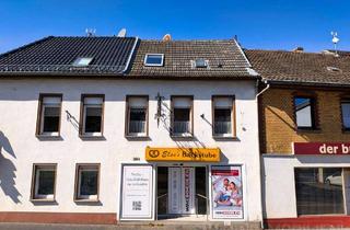 Anlageobjekt in 53639 Königswinter, Werbewirksames Wohn-/ Geschäftshaus mit Ladenlokal, Lager und Innenhof in Heisterbacherrott!