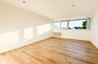 Wohnung kaufen in 76532 Sandweier, Stilvoll modernisierte 4-Zimmer-Wohnung mit Balkon und Garage in aufgewertetem Mehrfamilienhaus