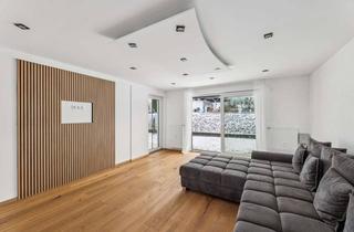 Wohnung kaufen in 94034 Hacklberg, Wohnen mit Stil – kernsanierte Wohnung mit großzügigem Garten und Terrassen