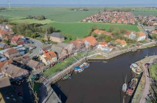 Wohnung kaufen in 26409 Wittmund, Einzigartiges Wohnen direkt am Hafen von Carolinensiel!