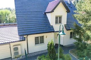 Einfamilienhaus kaufen in Am Waldrand 10, 16348 Wandlitz, Exklusives Einfamilienhaus in Wandlitz – überdachtes Schwimmbad & traumhafter Garten