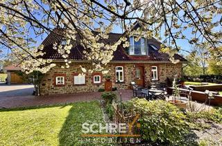 Haus kaufen in 49586 Neuenkirchen, Stilvoll im Grünen – modernisiertes Zuhause für Familien