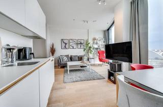 Loft kaufen in Hirschgarten, 80639 München, AIGNER - Wohnen über den Dächern: Modernes 1,5-Zimmer-Apartment mit einzigartigem Ausblick