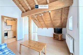 Wohnung kaufen in 84494 Neumarkt-Sankt Veit, Über den Dächern der Stadt – Stilvolle 2-Zimmer-Dachgeschosswohnung mit Weitblick und zwei Balkonen